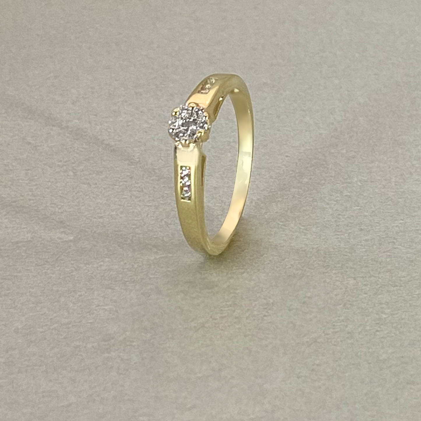 9ct Yellow Gold Channel and Centre Diamond Ring