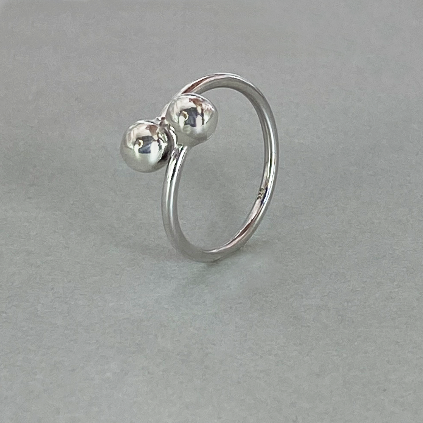 Silver Plain Crossover Two Ball Ring