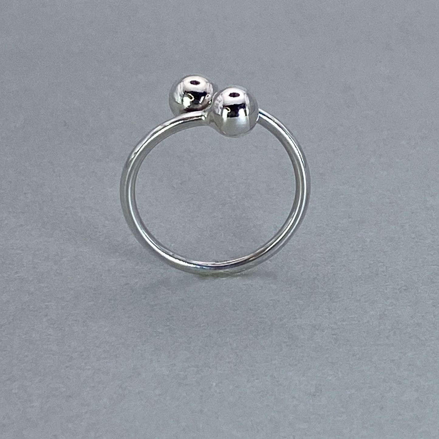 Silver Plain Crossover Two Ball Ring