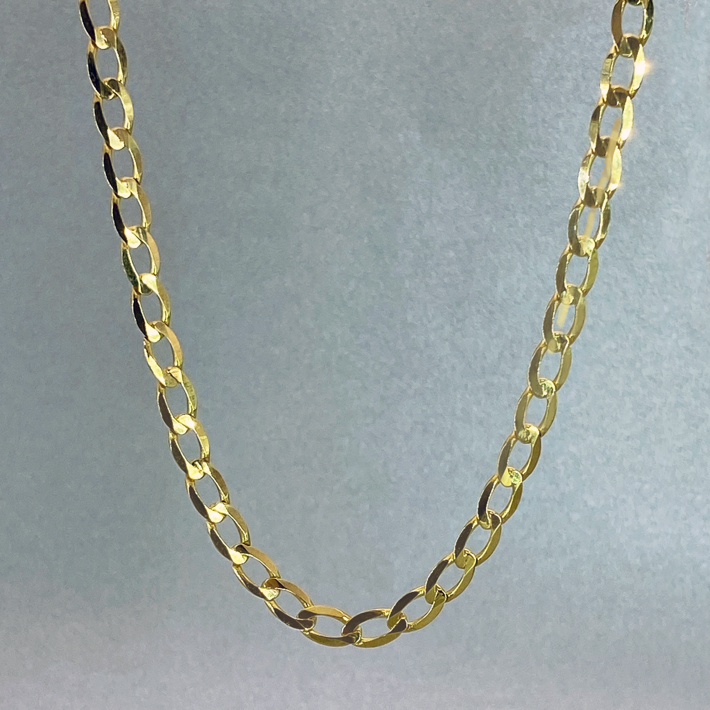 9ct Yellow Gold 55cm Flat Oval Curb link Bevelled Edge Chain