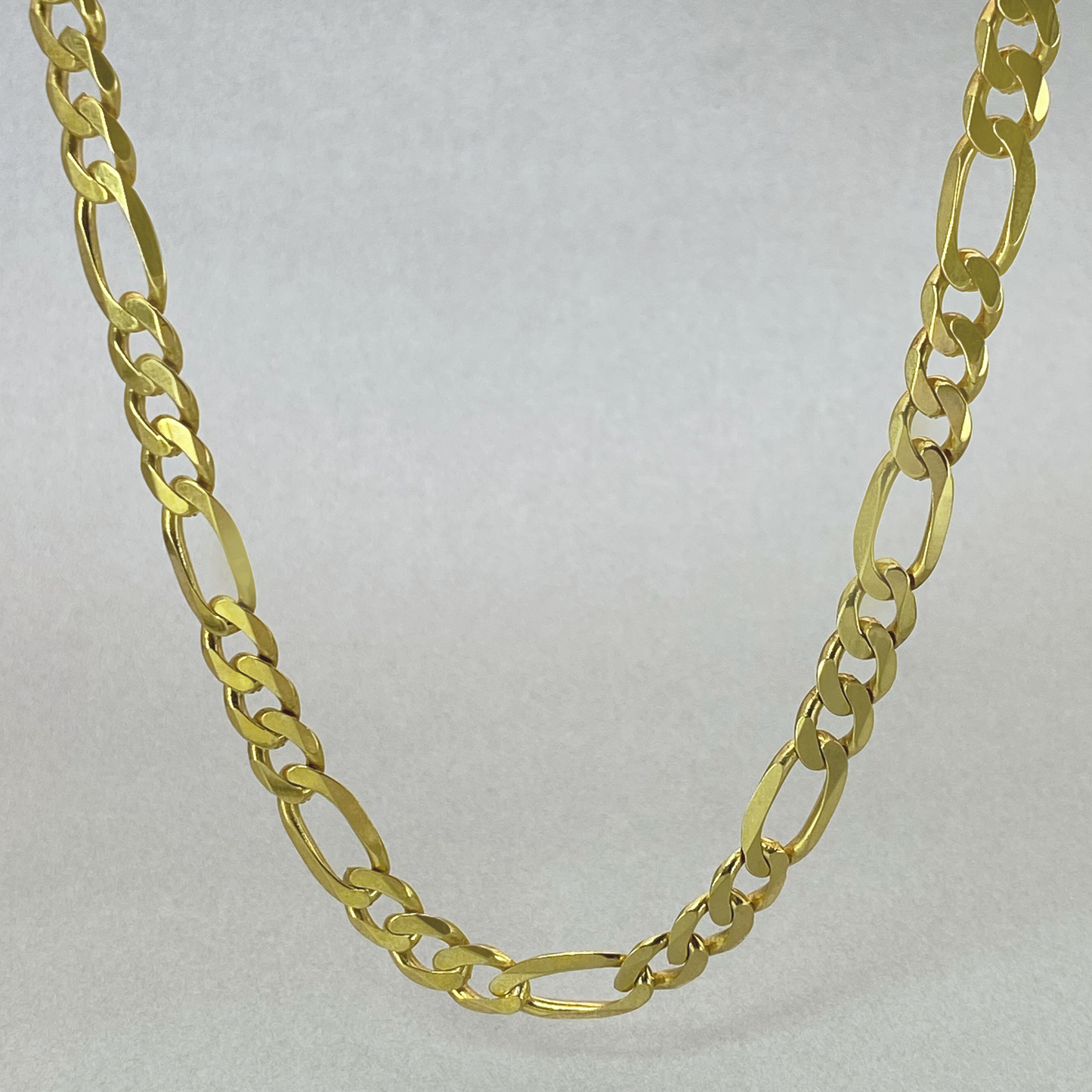 9ct Yellow Gold 60cm Figaro 3+1 Bevelled Chain