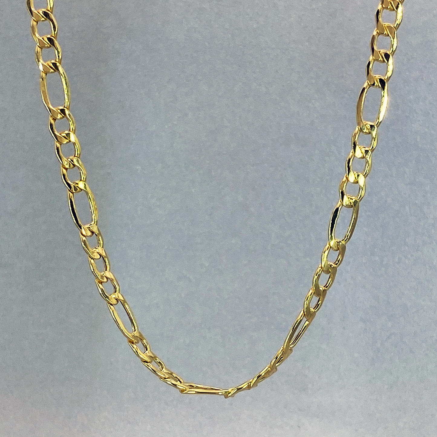 9ct Yellow Gold Air Solid 60cm Figaro3+1 link Chain