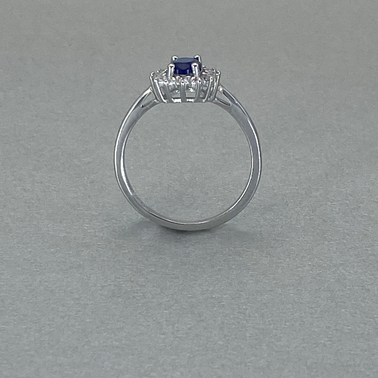 Silver CZ Blue Oval Centre Stone Cluster Ring