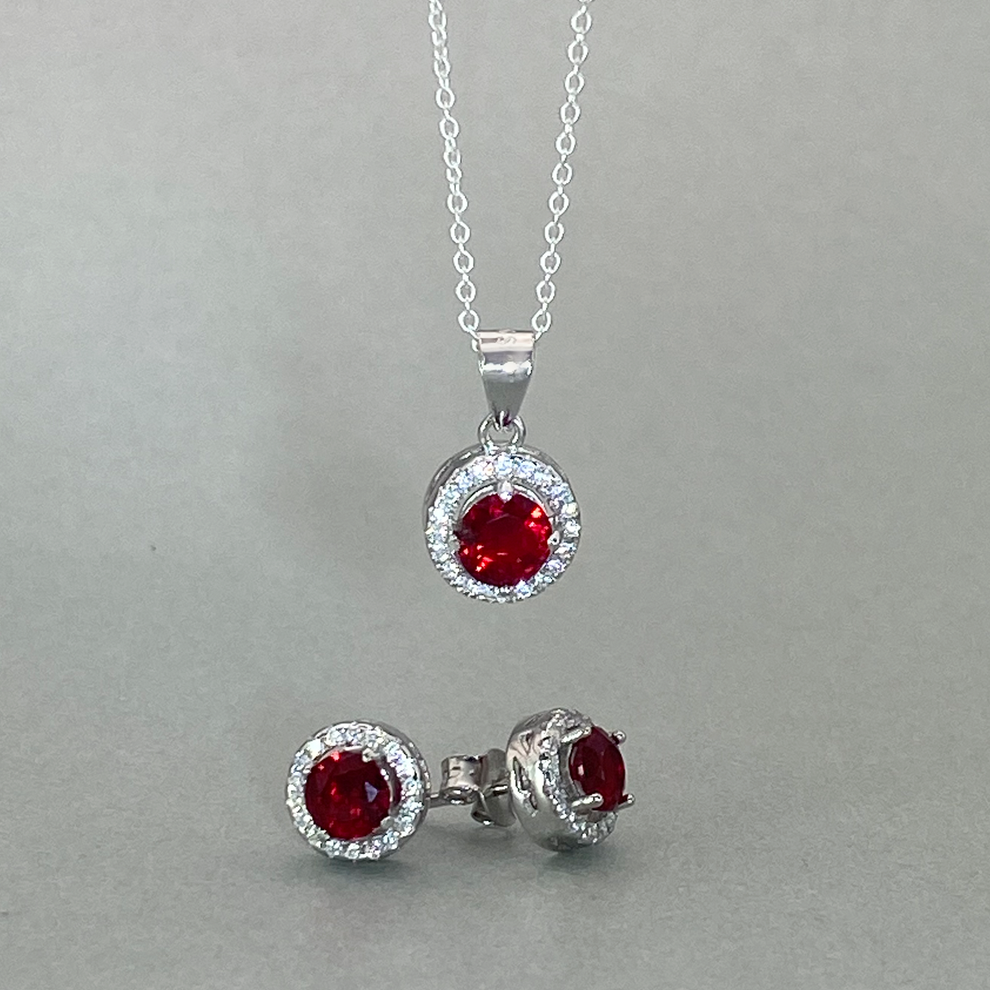 Silver CZ Red Round Centre Stone Cluster Earring & Pendant Set