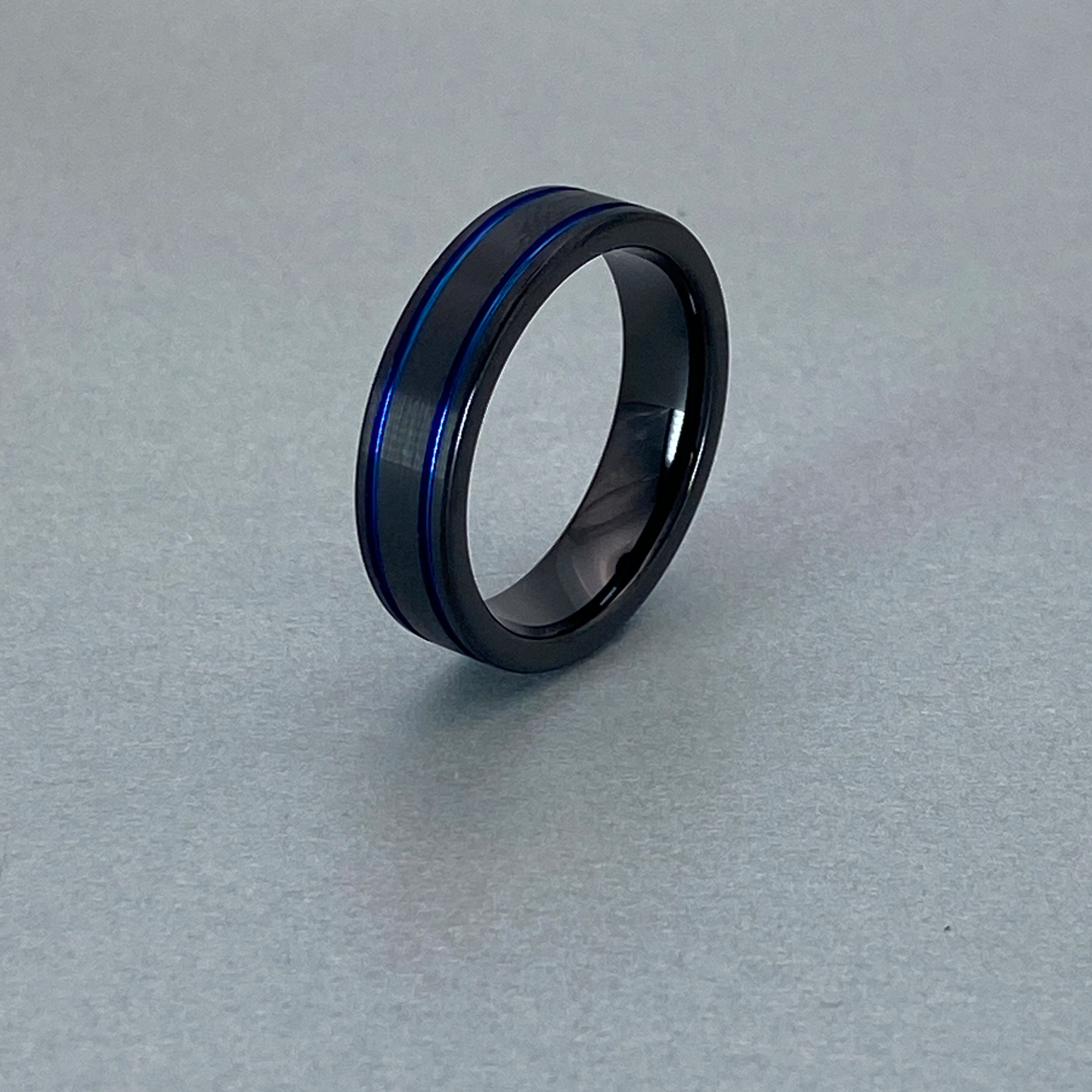 Tungsten Ring , Brushed IP Black Flat with 2 IP Blue plated Grooves and shiny Black inner.
