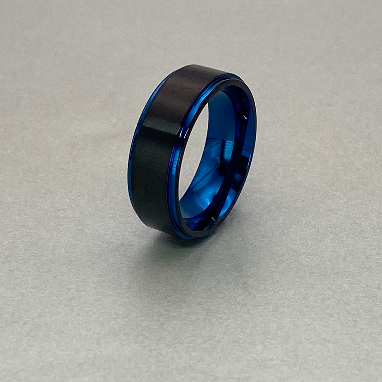Titanium Ring 8mm, Inside & Step Edge with Polished Shiny IP Blue Plating, Center Brushed IP Black Plating.