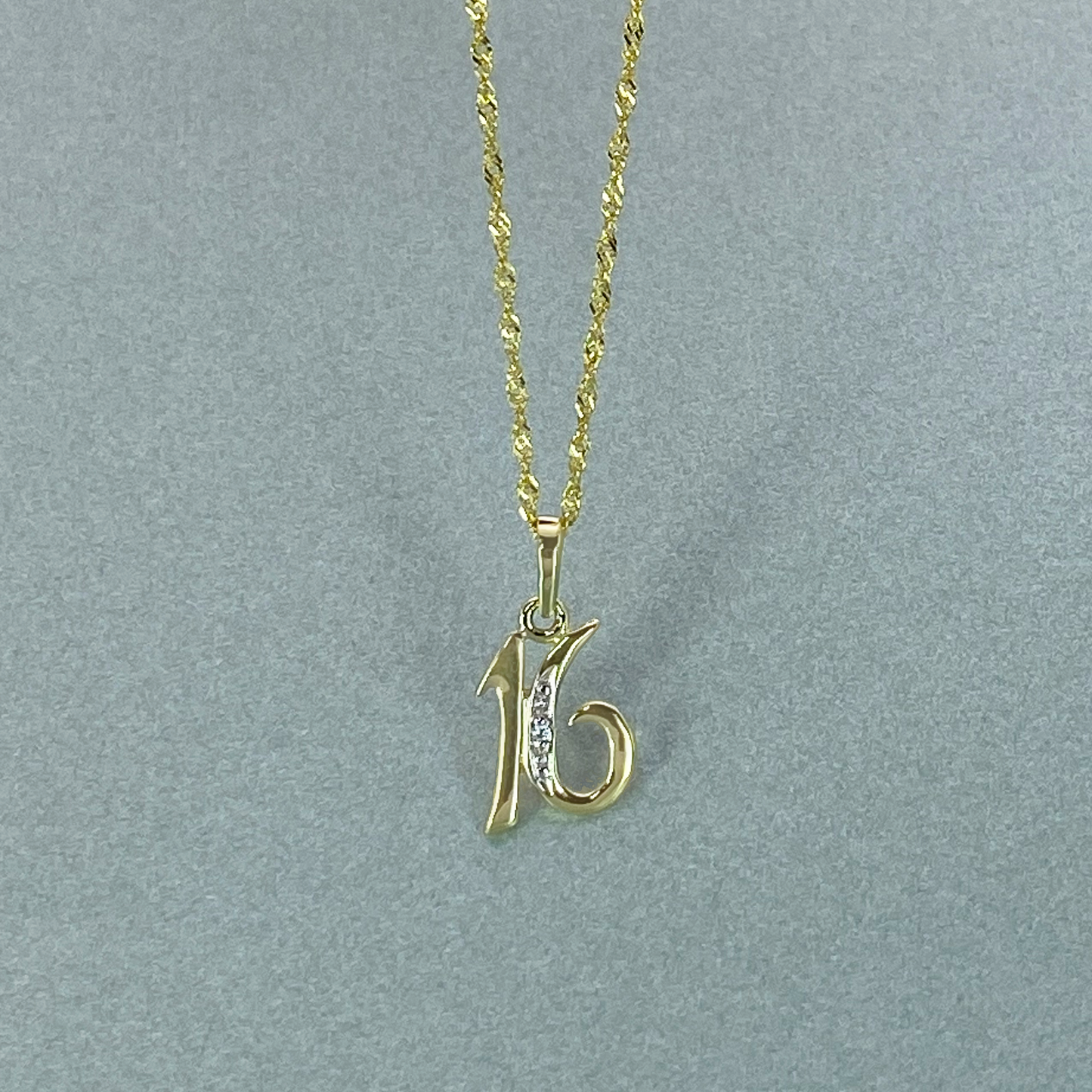 9ct Gold 16 Pendant  with Cubic Zirconia, Including 9ct bonded chain