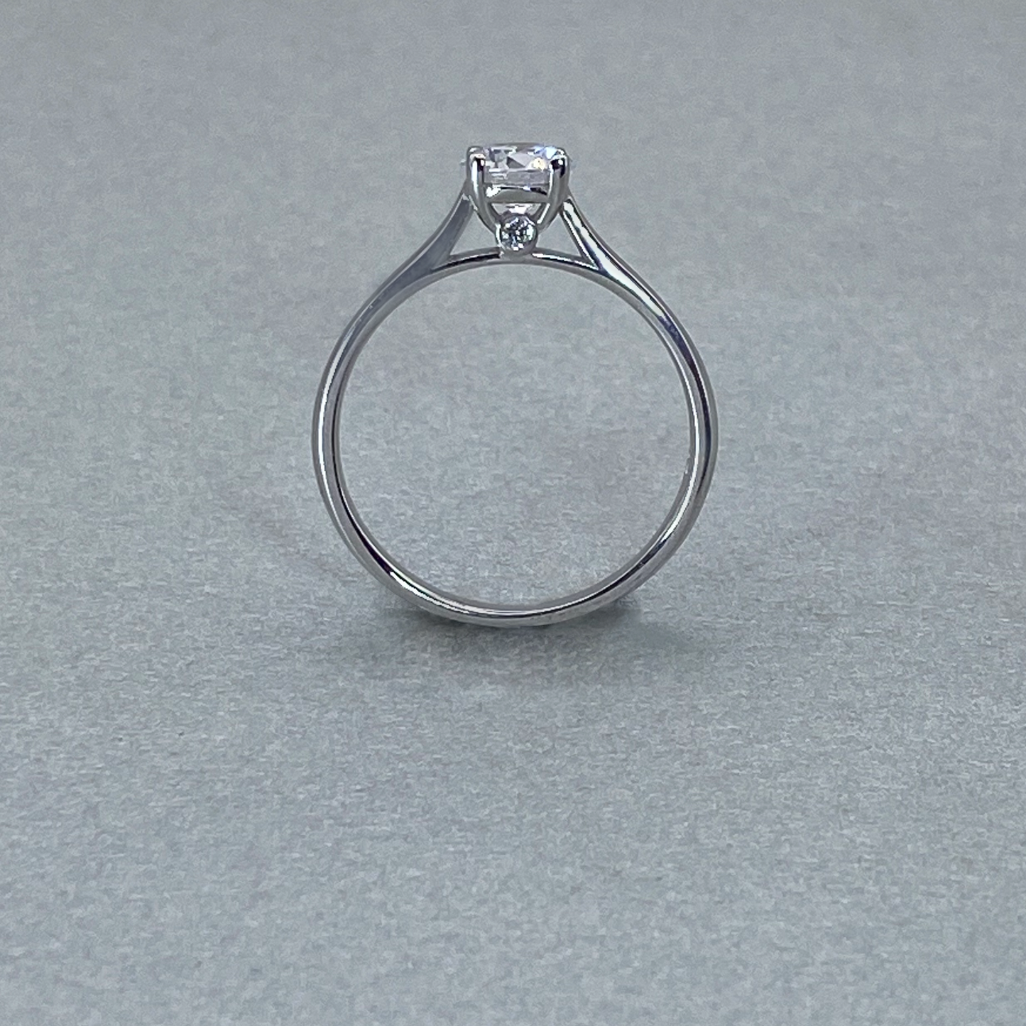 9ct White Gold  CZ Solitare Ring Side CZ's On Bridge (0.50)