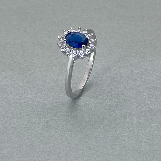 Silver CZ Blue Oval Centre Stone Cluster Ring